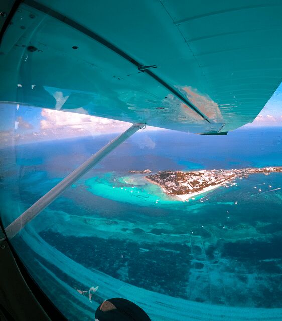 Panoramic flight to Cancun Hotel Zone and Isla Mujeres - The Sum Up