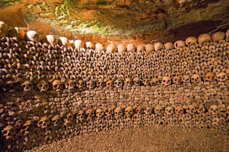Paris: Catacombs Entry & Seine River Cruise with Audio Guide - Key Points