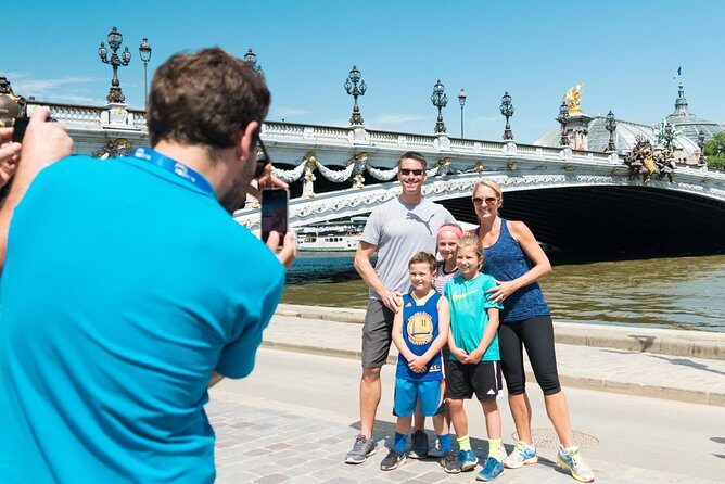 Paris Highlights Bike Tour: Eiffel Tower, Louvre and Notre-Dame - Grand Palais and Champs-Elysées