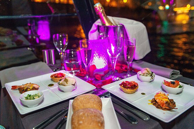 Paris Seine River Dinner Cruise with Champagne and Window Seating - Seating and Atmosphere