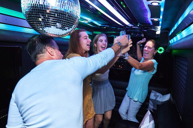 Party Bus Excursion Disco Ball, Limo Seating, Bar, & LED Lights - Who Would Love This Tour?
