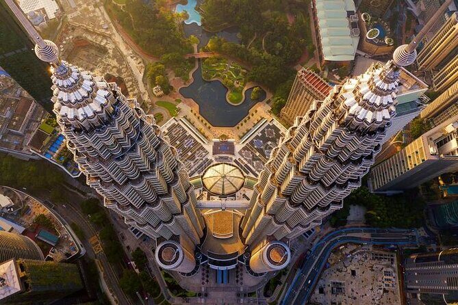 Petronas Twin Tower Skybridge View & Dining Experience Tour with Local Host - Key Points