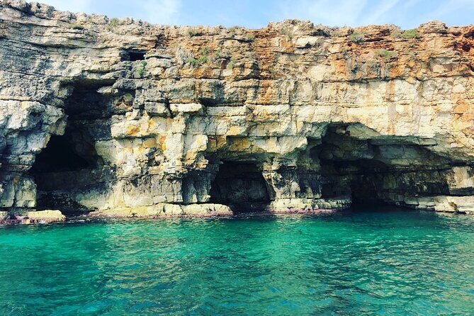 Polignano a Mare boat tour emotions, caves, diving and appetizers - The Sum Up