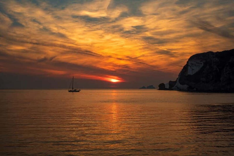 Ponza: Sunset by boat with aperitif and swim at Chiaia di Luna - Key Points