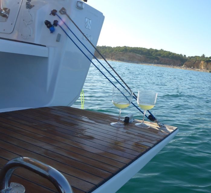 Portimão: Private Sailing Boat Tour with Swim and Wine - The Sum Up