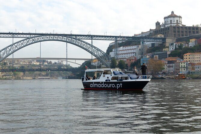 Porto: Boat trip on Douro river , six bridges /Sunset opcion - The Sum Up