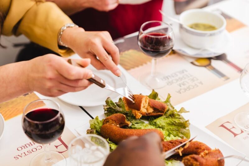 Porto: Food & Wine Tasting Walking Tour with Port Wine Cave - Local Food Pairings and Traditional Dishes