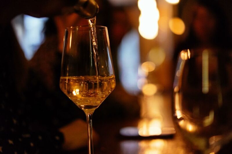 Porto: Private Evening Tour with Drinks & Bites - Visiting hotspots favored by locals