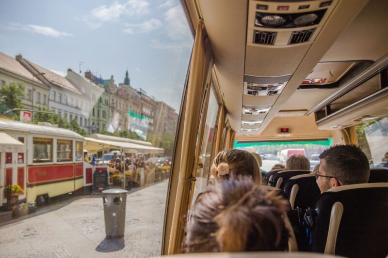 Prague: Guided Bus & Walking Tour with River Cruise & Lunch - Walking through the Old Town