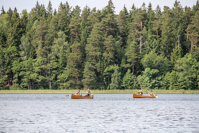 Premium guided Canoe Tour in lake Plateliai Handcrafted inventory and picnic set - The Sum Up