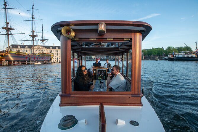 Private Boat Tour Amsterdam - 90 Min incl. welcome drink on historic saloon boat - A Closer Look at the Experience