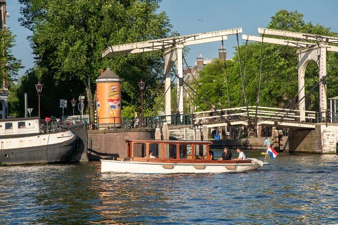 Private Boat Tour Amsterdam - 90 Min incl. welcome drink on historic saloon boat - Who Should Book This Tour?