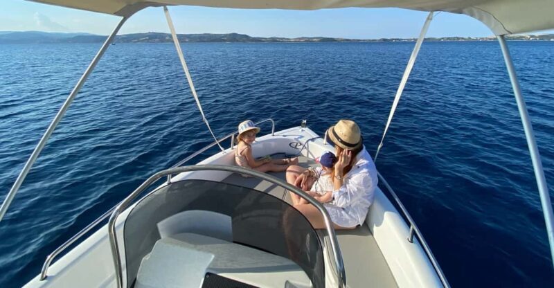 Private boat trip Diaporos or Ammouliani with electric van - The Sum Up