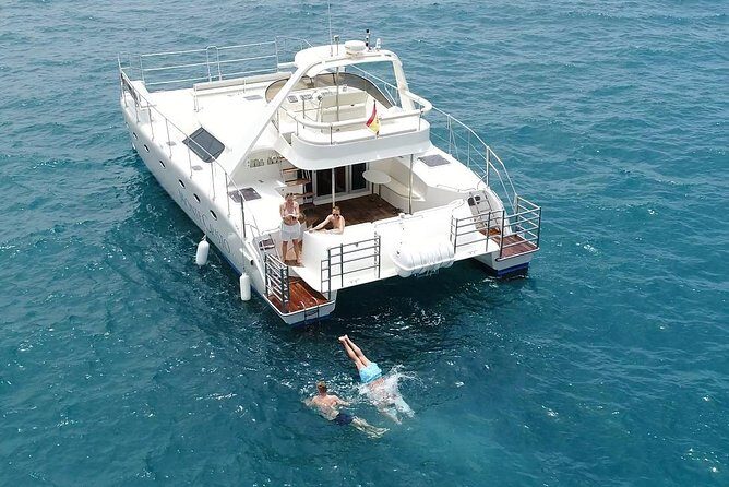Private Catamaran Charter with Transfer, Buffet and Snorkeling - The Sailing Experience: Relaxation and Scenic Views