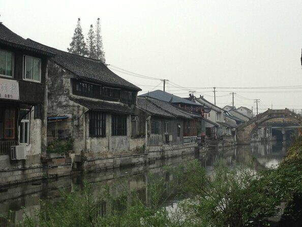 Private Fengjing and Xitang Water Town Sunset Boating Tour with Dinner from Shanghai - An In-Depth Look at the Tour Experience