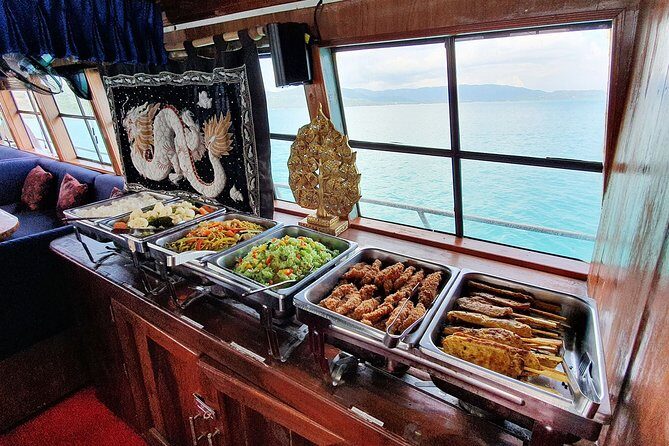Private Full-Day Red Dragon Yacht for Snorkeling Koh Tan & Visit Pink Dolphin - A Day Packed with Unique Stops and Experiences