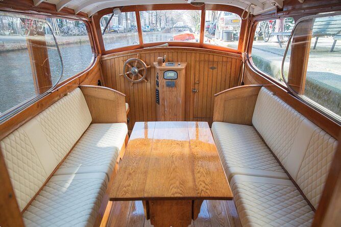 Private Guided Historic Amsterdam Canal Cruise in a Salon Boat - What Sets This Tour Apart?