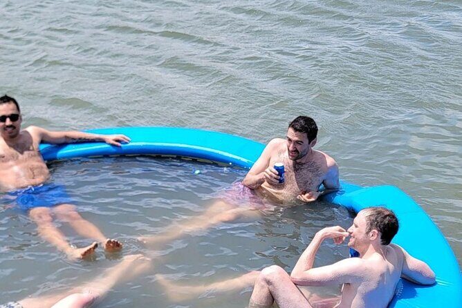 Private Tiki Boat Beach from Tybee Island Swim and Chill - An Authentic Tybee Island Water Adventure