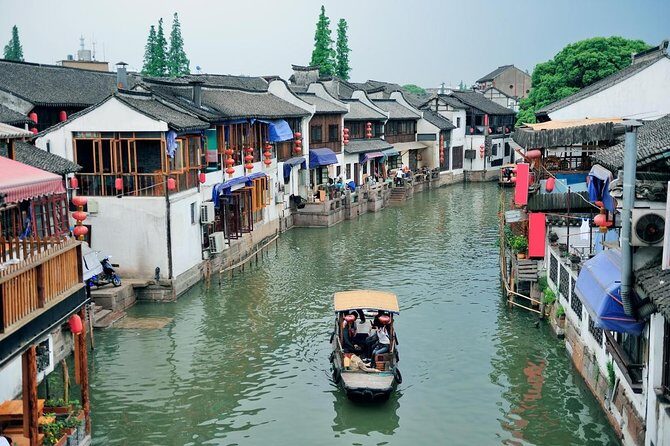 Private Tour of Shanghai Highlights and Zhujiajiao Water Town in One Day - Key Points