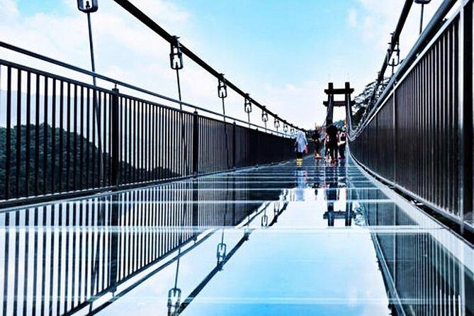 Private Tour to Gulong Canyon with Glass Bridge and Water Falls from Guangzhou - FAQs