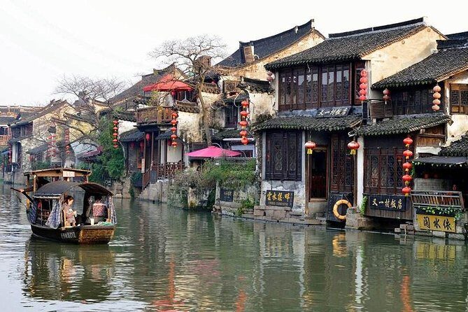Private Tour to Xitang and Liantang Water Town from Shanghai with Dinner and Boat Ride - Key Points