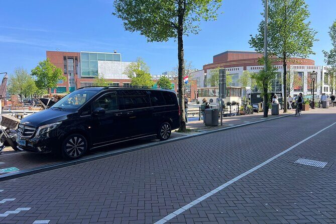 Private Transfer from Amsterdam Schiphol Airport to Amsterdam - The Sum Up