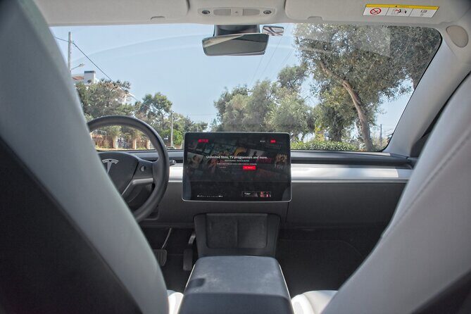 Private Transfer from Athens Airport to Athens City with Tesla - The Experience: What You Can Expect from the Tesla Transfer