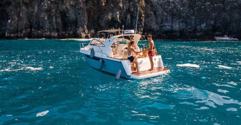 Puerto Colón: Coastal Boat Cruise with Swimming and Snacks - Key Points