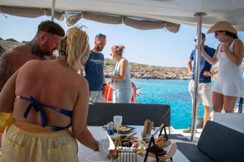 Rethymno: Sailing Catamaran Cruise & Premium Meal & Drinks - The Return and Drop-off