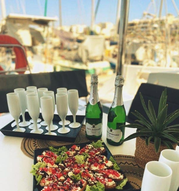Rethymno: Sunset Catamaran Cruise with Wine and Snacks - The Sum Up