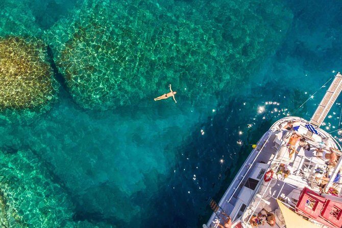 Rhodes Exclusive Swim Cruise with Greek Gourmet Buffet & Drinks - Ladikos Bay: A Historic Trading Hub