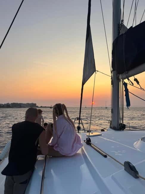 Rhodes: Sunset Catamaran Cruise with Snack, Fruits & Drinks - Key Points