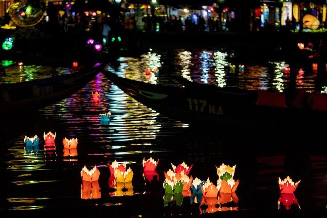 River Boat Ride by Night with Drop Flower Lantern in Hoi An - The Sum Up
