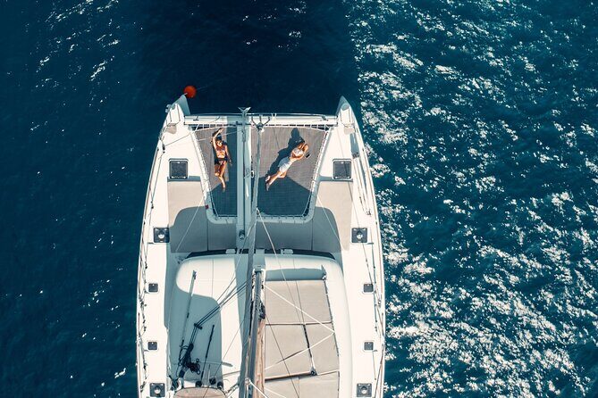 Romantic Sunset Catamaran Caldera Cruise incl. Meal & Drinks - Sunset in Oia & Scenic Sailing