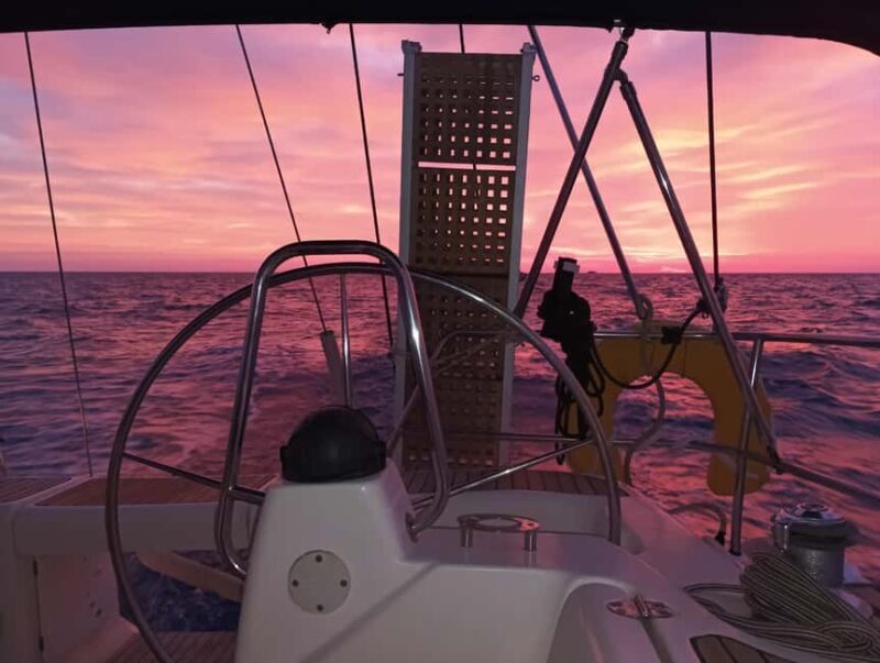 Romantic Sunset Cruise in Kissamos: Music, Wine, Giving Back - Key Points