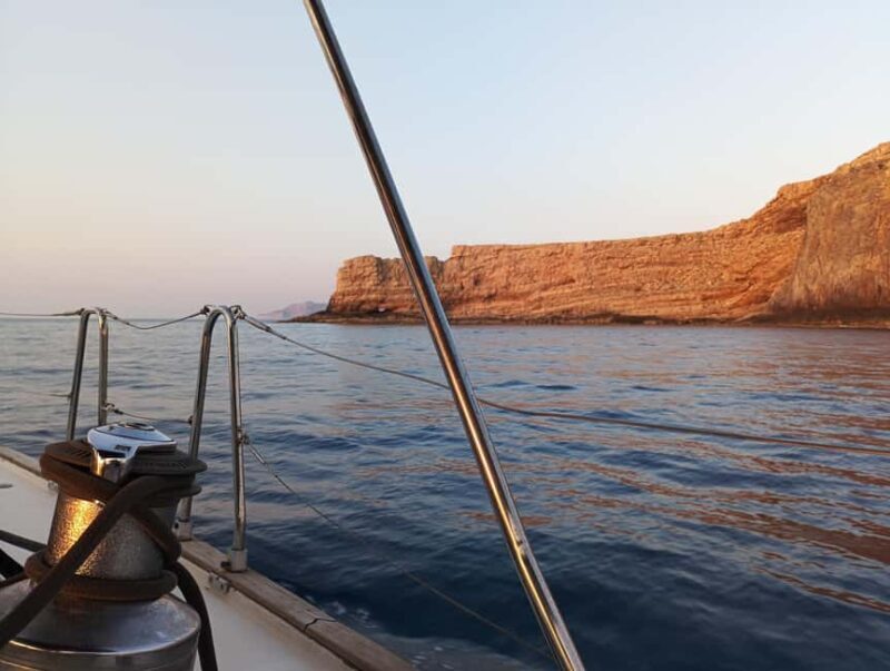 Romantic Sunset Cruise in Kissamos: Music, Wine, Giving Back - The Experience in Detail