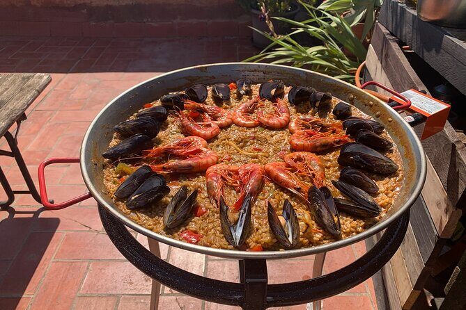 Rooftop Paella Seafood Cooking Class Experience in Barcelona - Cancellation and Practicalities