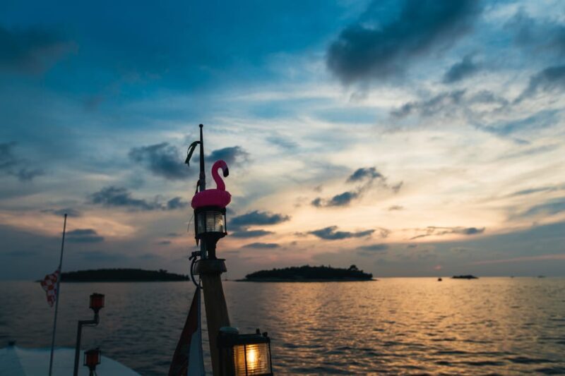 Rovinj: Sunset Cruise with Swim Stop, Drinks, and Fruits - Key Points
