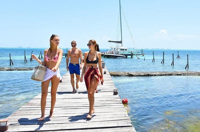 Sail to Paradise Catamaran Tour with Snorkel and Beach Club - The Sum Up