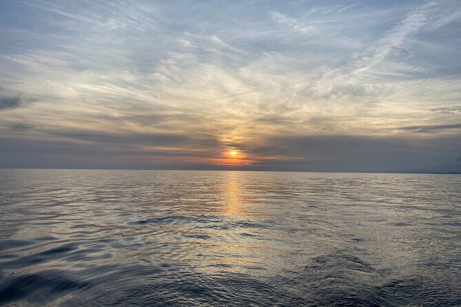 Sailing at sunset along the cliffs of Maro-Compartida - Sailing at Sunset Along the Cliffs of Maro-Compartida: An Authentic Coastal Experience