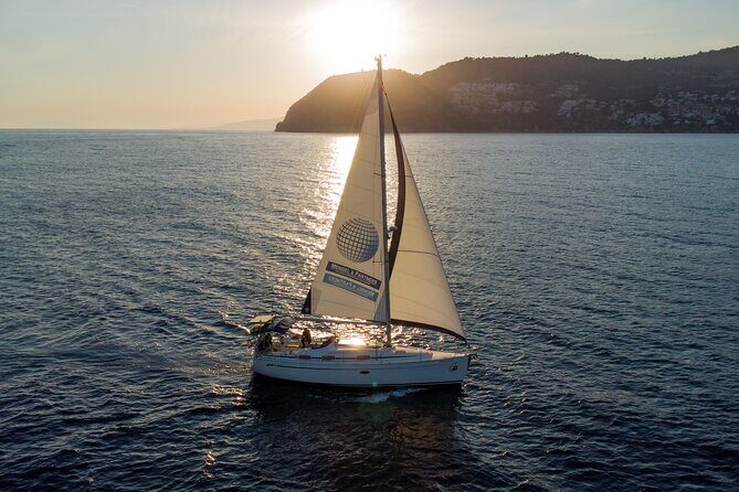 Sailing at sunset along the cliffs of Maro-Compartida - How the Experience Compares