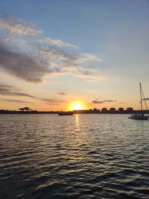 Sailing with sunset and swim in the sea - Key Points