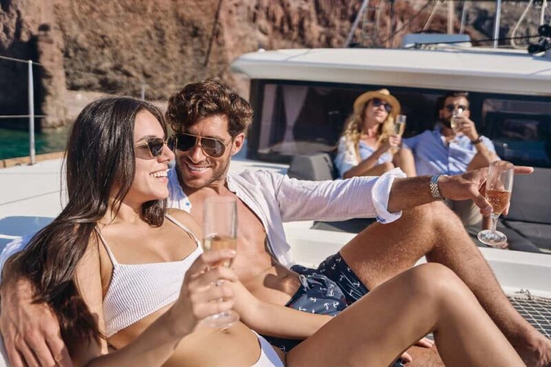 Santorini: Caldera Luxury Catamaran Cruise w/ Meal & Drinks - Diving into the Experience