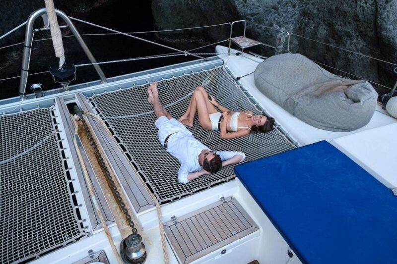 Santorini: Catamaran Cruise with BBQ and Drinks - The Sum Up