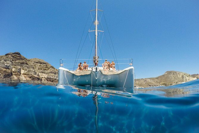 Santorini Catamaran Cruise with Fresh Meal and Open Bar - Key Points