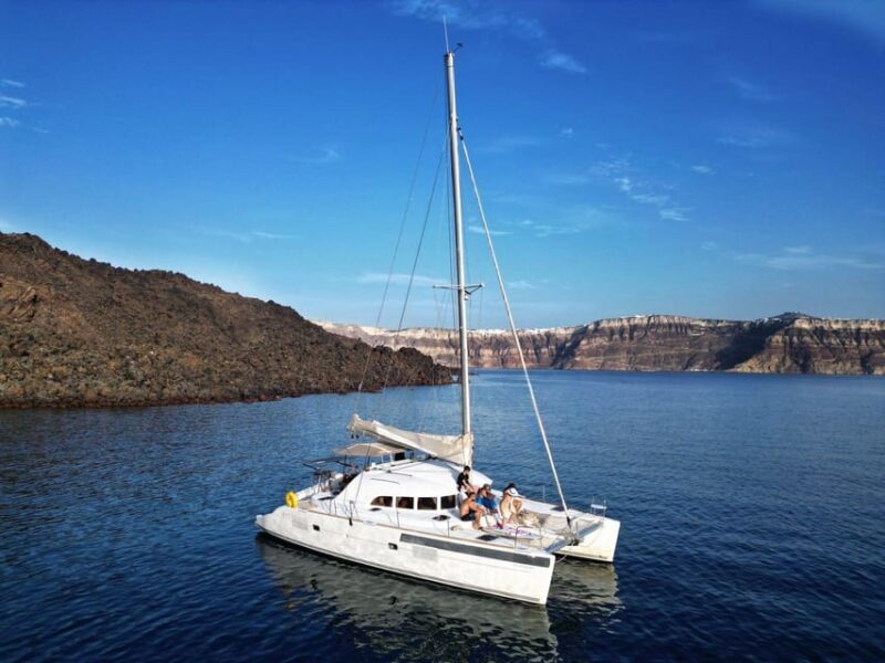 Santorini: Catamaran Cruise with Greek BBQ and Drinks - Key Points