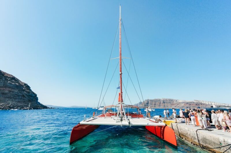 Santorini: Catamaran Tour with BBQ Dinner, Drinks, and Music - Key Points