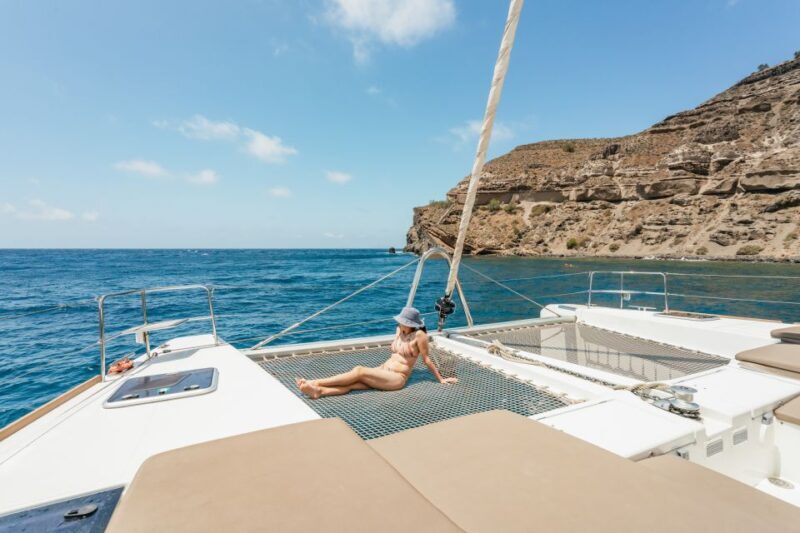 Santorini: Luxury Catamaran Day Trip with Meal and Open Bar - Key Points