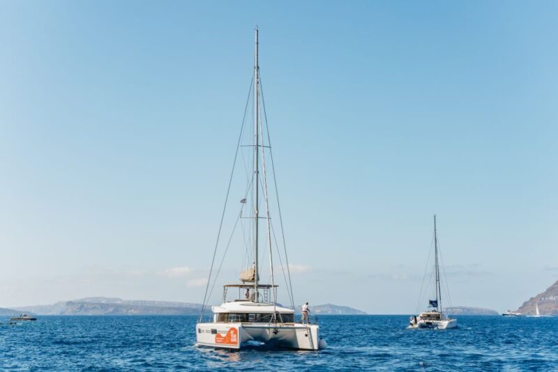 Santorini: Luxury Catamaran Day Trip with Meal and Open Bar - The Sum Up