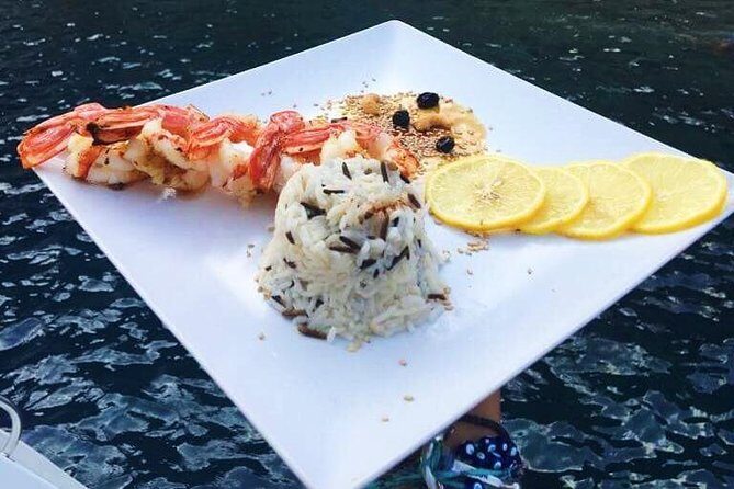 Santorini Luxury Catamaran Sunset Cruise with BBQ, Drink and Transfer - An In-Depth Look at the Experience